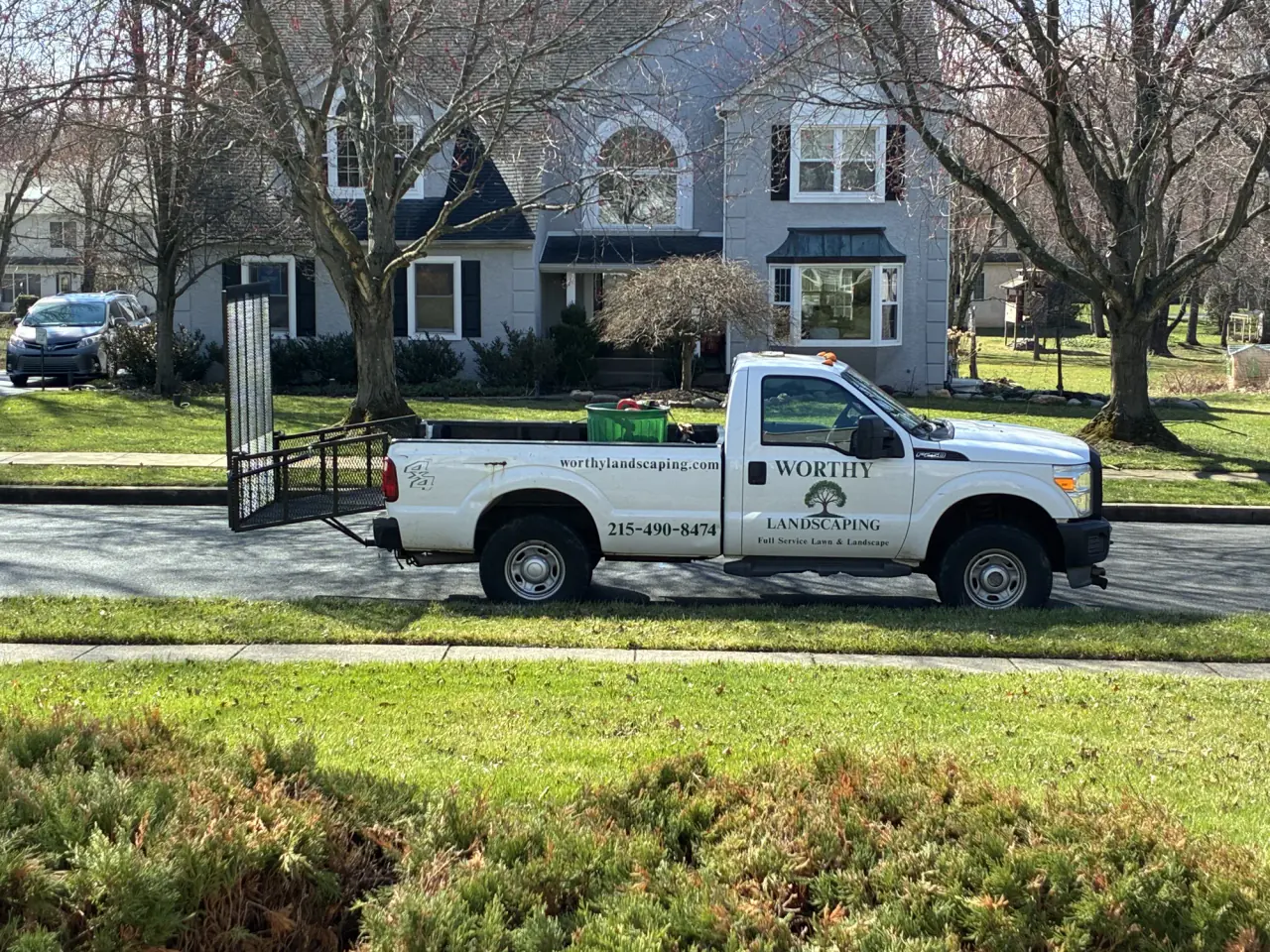 Worthy Landscaping branded work truck